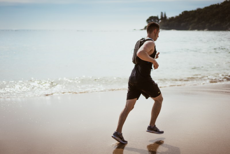 Running on the beach with sports shoes